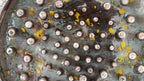 Close-up of Lightphire artwork showing layered textures and raised circular elements, abstract fine art print by Burningpictures