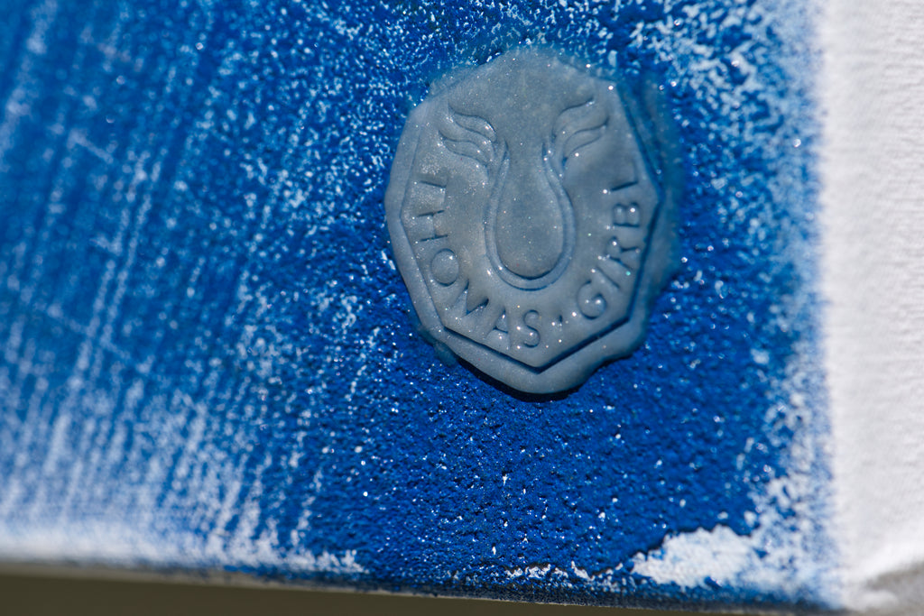 Artist signature of Thomas Girbl in transparent fire-fused pigment on Memory of the Primordial Sea, lower right corner