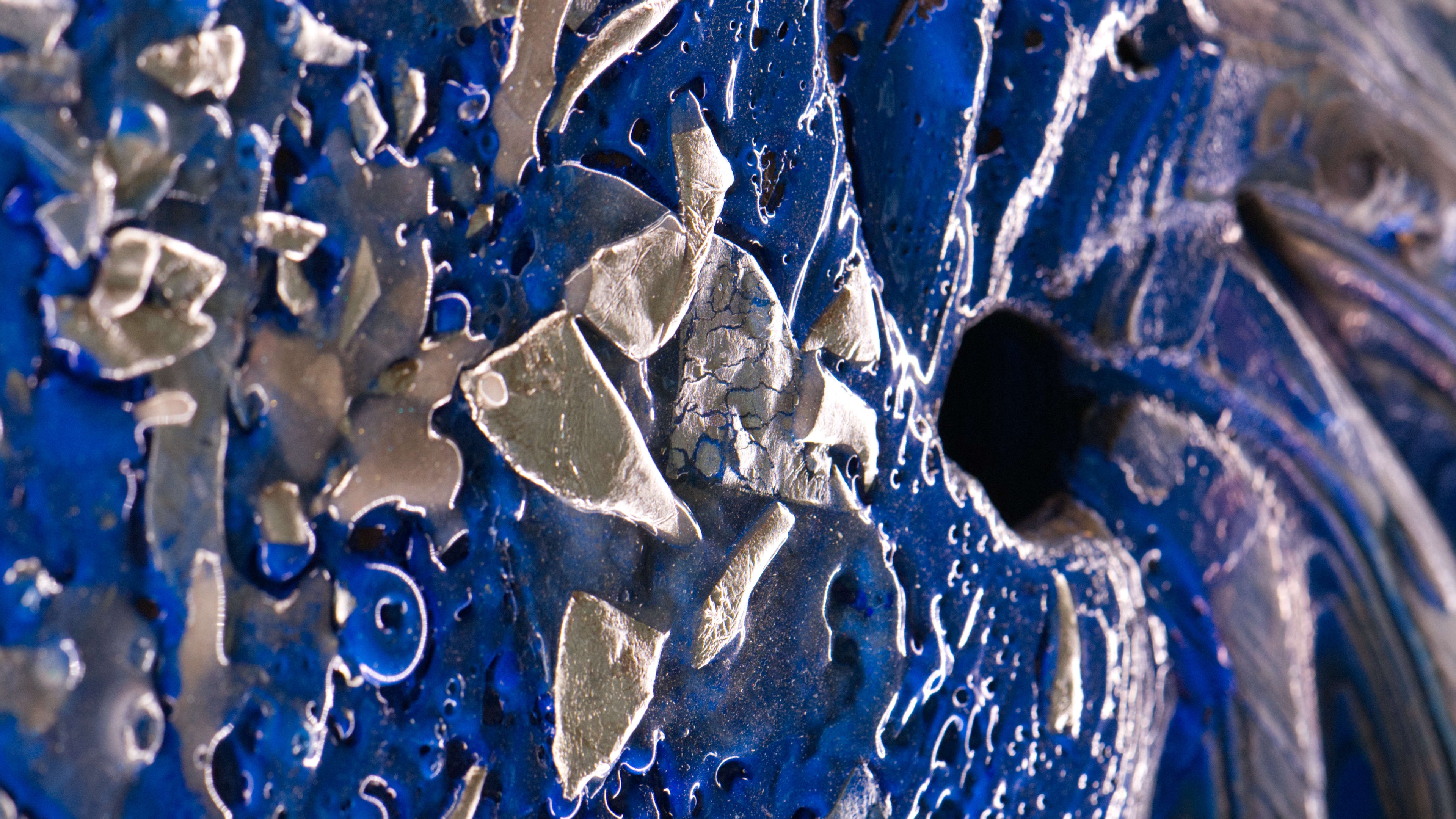 Close-up of Pedelight artwork showing ultramarine textures and embedded palladium fragments, abstract circular fine art print by Burningpictures