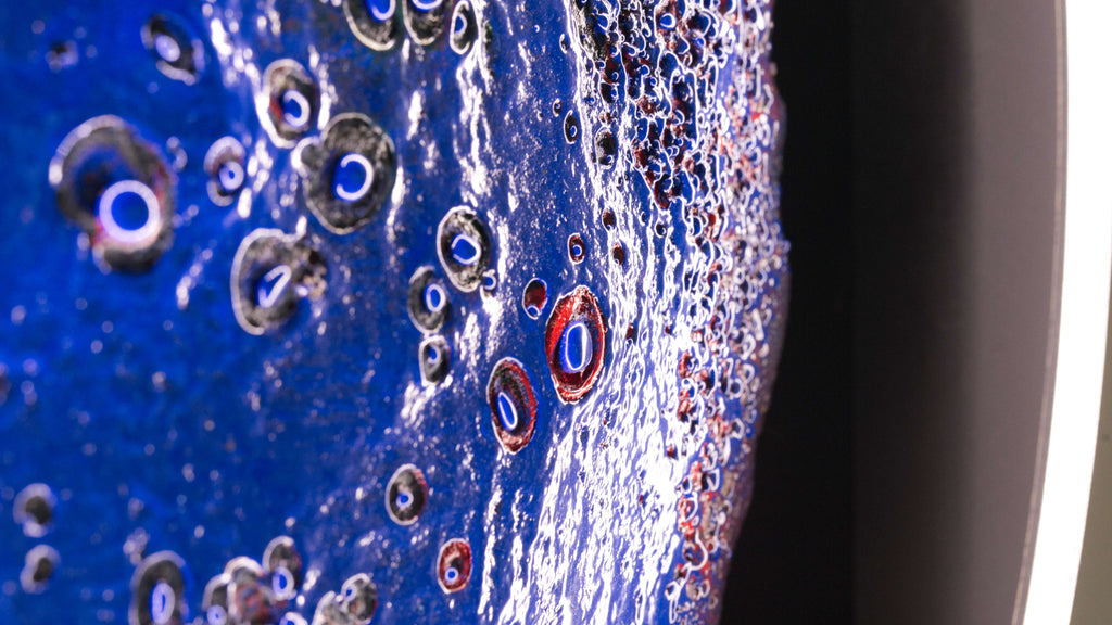 Close-up of Seasolight artwork showing layered blue textures and organic structures, abstract circular fine art print by Burningpictures