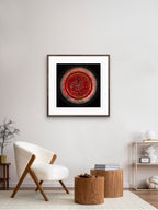 Simlight framed light art print on modern wall interior, circular artwork exploring material transformation with palladium by Burningpictures