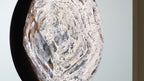 Close-up of Winterlight artwork showing layered white textures and subtle material variations, abstract circular fine art print by Burningpictures