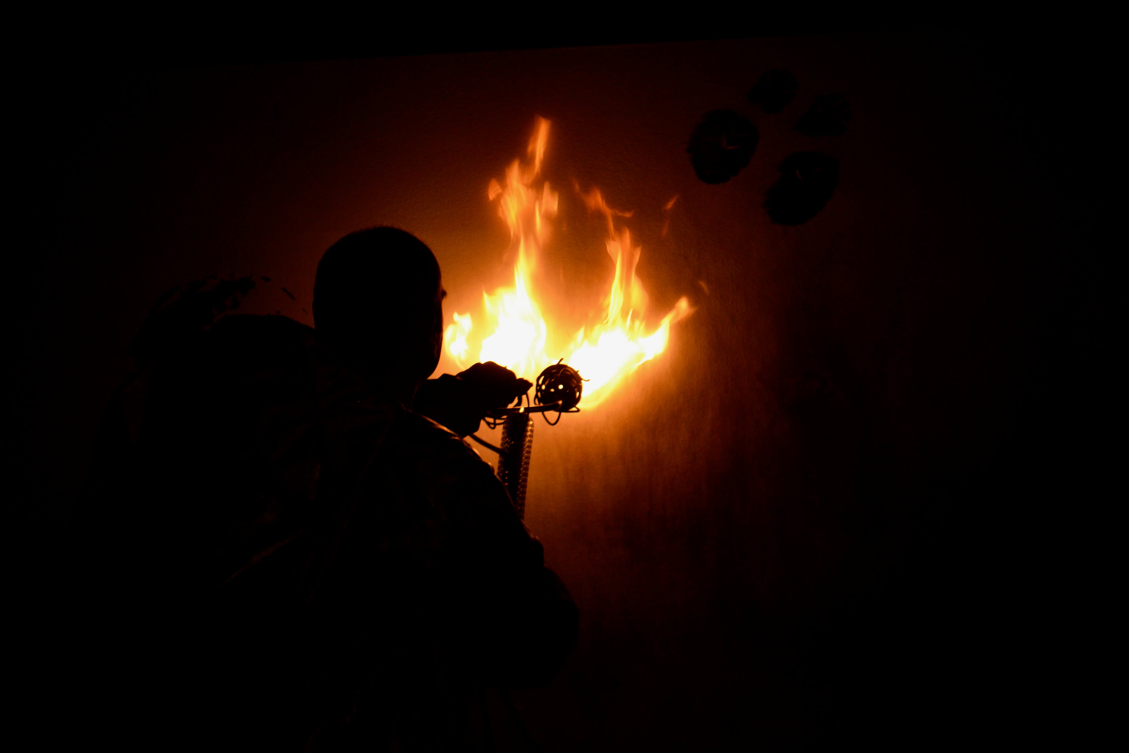 Thomas Girbl creating artwork with fire during Burningpictures process